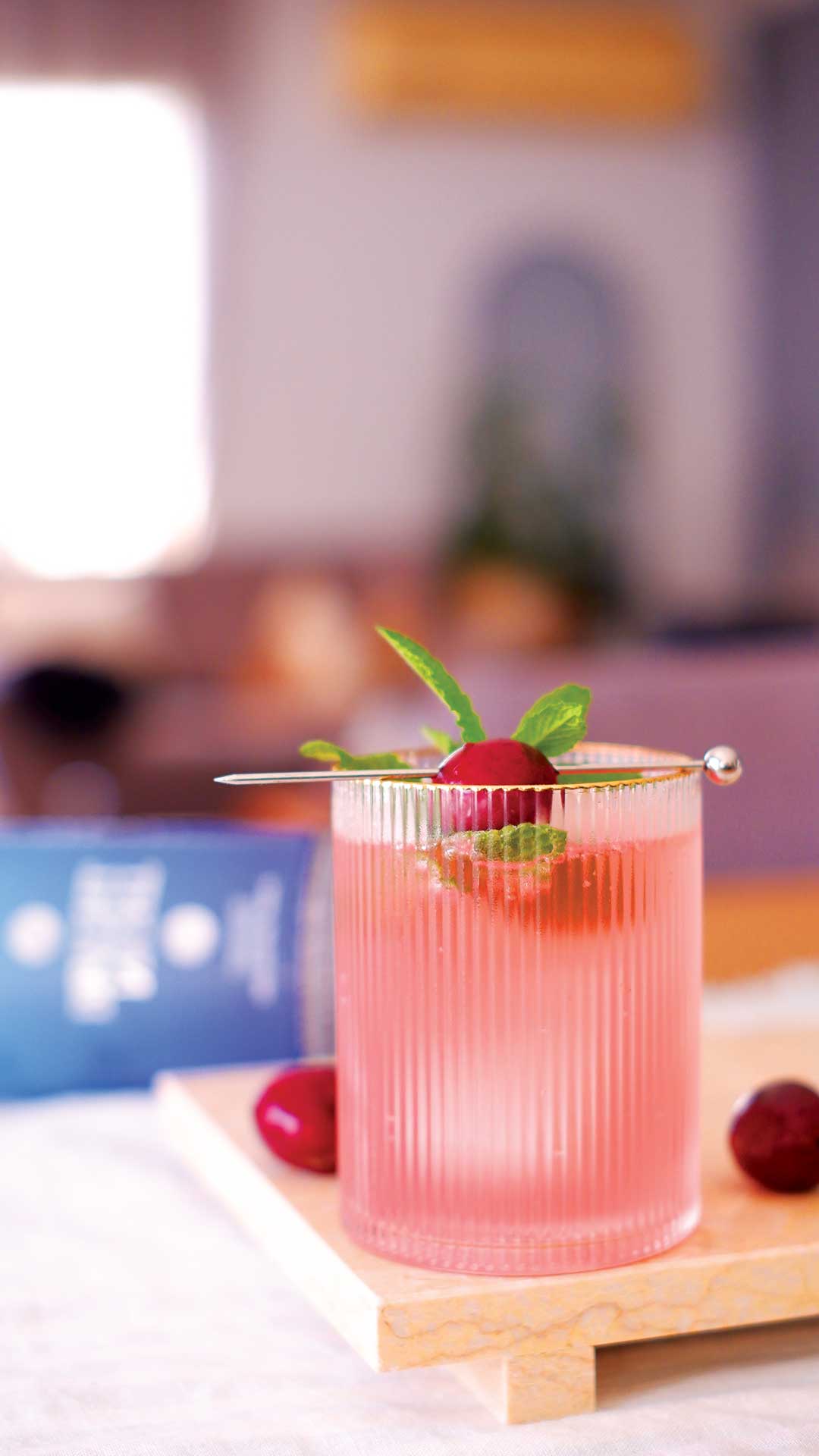 Cherry gin and tonic cocktail